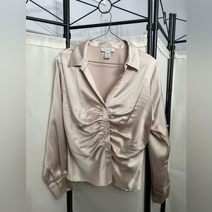 Satin top has front feature, classy and sexy fit all in one